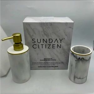 This new set comes with toothbrush holder and rinse cup in a nice resin finish.